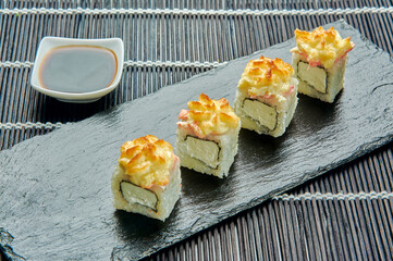 sushi with omelette, cream cheese and sesame seeds.