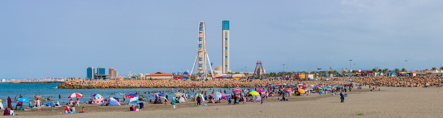 Algiers, panorama Cityscape for The Capital Of Algeria inculding Djamaa el Djaza&iuml;r also known as the Great Mosque of Algiers and sablette amusement park with the ferris wheel