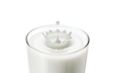 Closeup of milk drop in glass create ripple wave and splash in crown shape. Dropping milk in milk...