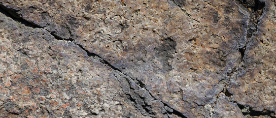 Granite stone surface texture. Texture of rough granit stone surface background. Abstract background from natural material