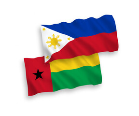 Flags of Republic of Guinea Bissau and Philippines on a white background