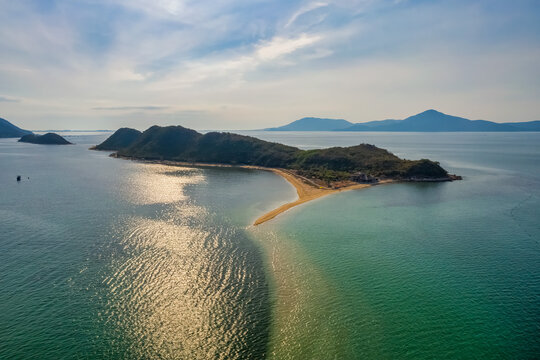 Diep Son island, where a road emerges in the middle of the sea during low tide, Nha Trang, Khanh Hoa, Vietnam. 
