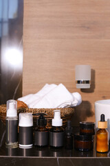 Fototapeta na wymiar Different cosmetics products on the bath background