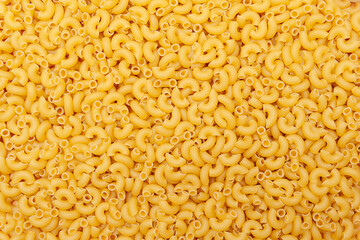 Background of raw pasta Elbow macaroni
