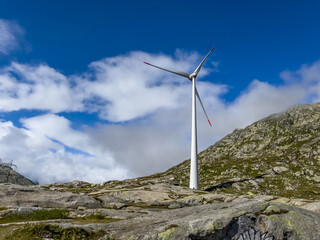 wind power plant on St Gotthard pass mountain peak