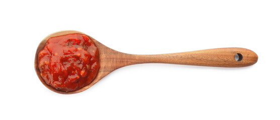 Delicious adjika sauce in wooden spoon isolated on white, top view