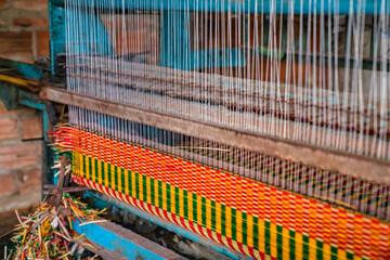 Weaving mats from papyrus at Hoai Nhon, Binh Dinh, Vietnam