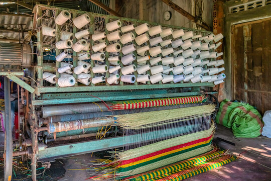 Weaving mats from papyrus at Hoai Nhon, Binh Dinh, Vietnam