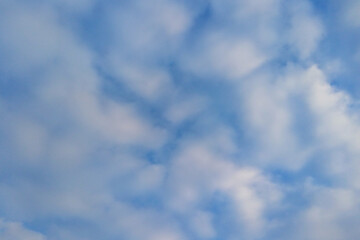 Beautiful background of white clouds against the blue sky.