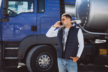 Man driver of the lorry in a logistic company