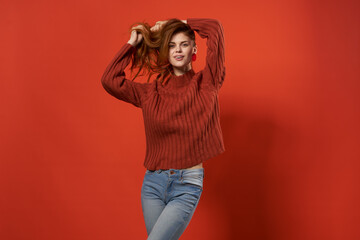 Cheerful woman fashion posing studio model