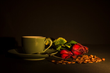 cup of coffee and rose