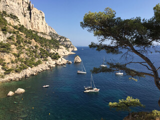 View of the Calanque des Pierres Tombées seen from the footpath descending to the Calanque de Sugiton in Marseille, France.