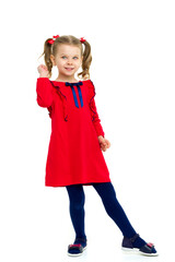 Cute little girl with ponytails in red dress