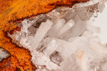 Macro mineral stone crystals Hemimorphite rock on a white background