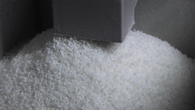 Plastic granules fill the tank for further sorting. Copound