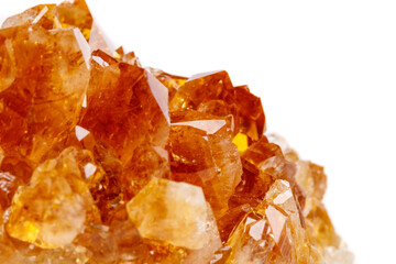 Macro mineral stone Citrine in rock in crystals on a white background
