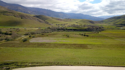 Green valley between mountains in Argentina