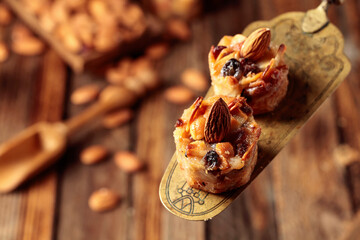 Small cakes with almonds, raisins, and honey.