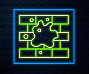 Glowing neon line Painting the house icon isolated on brick wall background. Vector