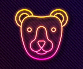Glowing neon line Bear head icon isolated on black background. Vector