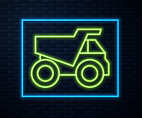 Glowing neon line Mining dump truck icon isolated on brick wall background. Vector