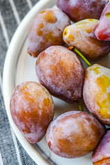 Indoor studio fresh prunes close-up