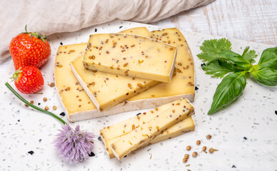 Cheese collection, matured cow cheese with mustard seeds from Belgium