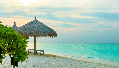 Colorful sunset at sandbank islands Madivaru Finolhu Rasdhoo Atoll Maldives.