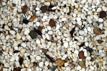 A surface mix grey and white stone  for texture and backgrounds.
