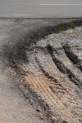 asphalt or tar road small part of it on the construction site made for heavy construction vehicles