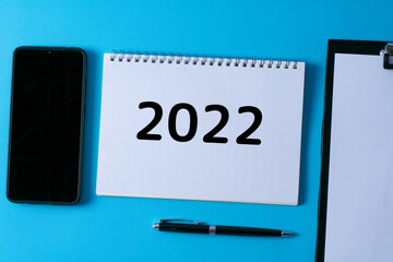 Word writing text 2022 in a notebook. Business concept.