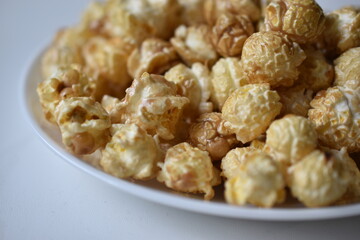 Popcorn covered with icing and caramel with sugar