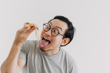 Funny face nerd Asian man has cheesy pizza isolated on white background.