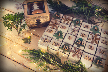 Homemade advent calendar made of cardboard for a environmentally conscious christmas.