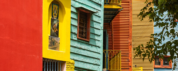 Caminito Street in La Boca, panorama with colorful buildings with colored windows in Buenos Aires