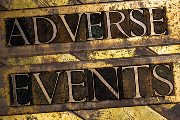 Adverse Events text on textured grunge copper and vintage gold background
