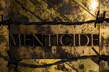 Menticide text on textured grunge copper and vintage gold background