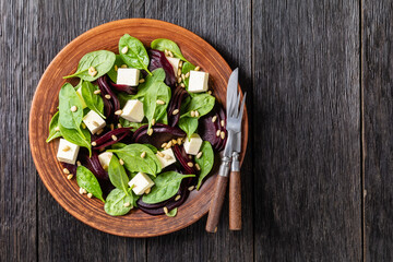 roasted beet salad with feta, spinach, pine nuts