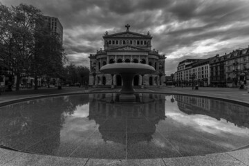 frontal view of the old opera building at dawn in Frankfurt, Germany