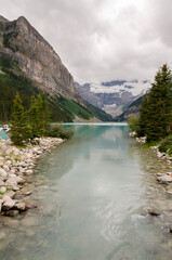 Lake Louise in cloudy day in summer in Banff National Park, Alberta, Canada