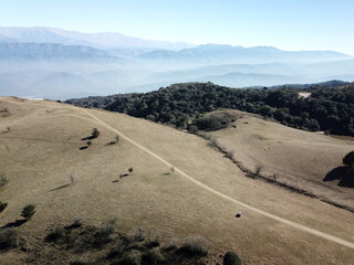 Villa Nougues area in the hills of Tucumán, town, meadow, wooded hills in autumn