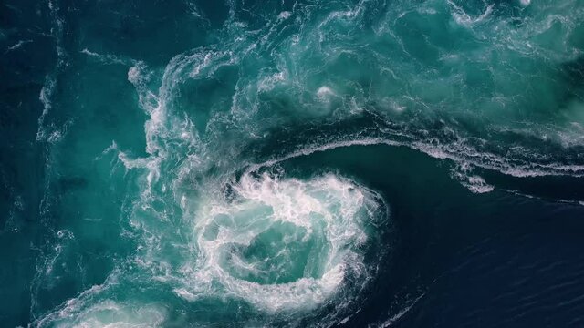 Waves of water of the river and the sea meet each other during high tide and low tide.