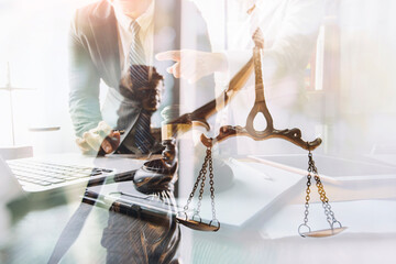 justice and law concept.Male judge in a courtroom on wooden table and Counselor or Male lawyer...