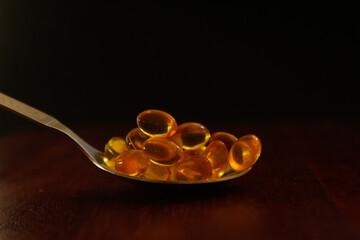 spoon full of cod liver oil pills.