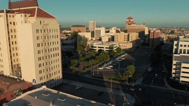 Aerial: Fresno city skyline at sunset. California, USA