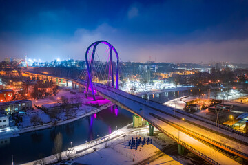 Fototapeta na wymiar Bridge over Brda river by night. Route in Bydgoszcz.