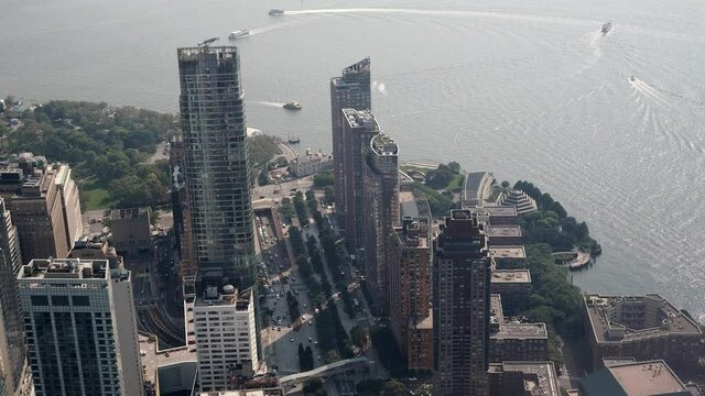 New York City, New York United States - August 29 2021: Traffic in upper Manhattan with buses, cars, trucks, and boats.  Video timelapse sped up by a factor of 8 times.