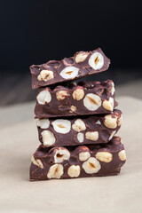 milk chocolate with whole and chunks of hazelnuts