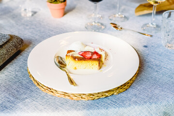 Exquisite dessert is an elegant and luxurious cake refinedly presented at a celebration.